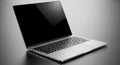Sleek modern silver laptop open and ready for use Royalty Free Stock Photo