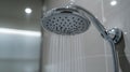 sleek modern silver showerhead on bathroom, chrome shower head Royalty Free Stock Photo