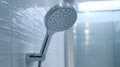 sleek modern silver showerhead on bathroom, chrome shower head Royalty Free Stock Photo