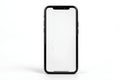 Smartphone with a blank white screen presented on a pristine white background showcasing high-quality studio photography Royalty Free Stock Photo