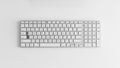 White keyboard with a minimalist design featuring a standard Royalty Free Stock Photo