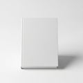 A sleek, modern, white, rectangular, metallic object standing upright against a plain background Royalty Free Stock Photo