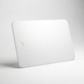A sleek and modern white rectangular object with a smooth surface and a small hole Royalty Free Stock Photo