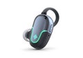 Sleek modern wireless earbud with glowing green accent and ear hook Royalty Free Stock Photo