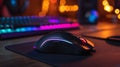 RGB Gaming Mouse with Mechanical Keyboard and Vibrant Bokeh Background Royalty Free Stock Photo