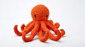 Sleek Orange Crochet Octopus Ink Uhd Image With Toy-like Proportions