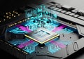 Futuristic AI Processor with Holographic Data Interface and Neon Light Trails on a Circuit Board Royalty Free Stock Photo