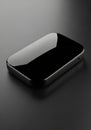 Sleek, rectangular black electronic device with rounded edges, possibly a portable hard Royalty Free Stock Photo