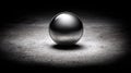 Shiny Metal Sphere on Textured Concrete Surface Royalty Free Stock Photo