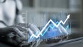 Futuristic Robot Hand Analyzing Data Trends and Growth Metrics on Digital Interface with Graphs and Charts Showing Royalty Free Stock Photo