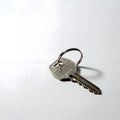 AI Generated Image - Silver Key with Ring on White Surface Royalty Free Stock Photo