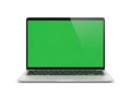 A sleek silver laptop with a bright green screen displaying a solid green background Royalty Free Stock Photo