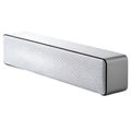 Sleek silver rectangular soundbar speaker with white perforated grille on white audio music Royalty Free Stock Photo