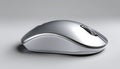 Sleek silver wireless computer mouse on a light gray background Royalty Free Stock Photo