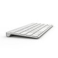 Sleek Silver Wireless Keyboard with White Keys on a White Background computer technology Royalty Free Stock Photo