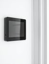 Sleek Smart Home Control Panel on a Minimalist Wall Royalty Free Stock Photo
