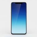 Sleek smartphone showcasing a gradient blue screen with minimalist design and edge-to-edge display Royalty Free Stock Photo