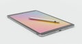 A sleek tablet with a slender metallic stylus resting on its screen