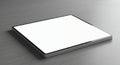 A sleek tablet with a white screen, featuring a slim metallic frame, rests on a flat