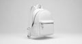 Sleek White Backpack with Metallic Zippers on a Minimalist Grey Background Royalty Free Stock Photo