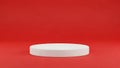 Sleek white circular platform against a striking red backdrop for showcasing products Royalty Free Stock Photo