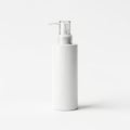 A sleek white pump bottle with a minimalist design standing upright against a plain background Royalty Free Stock Photo