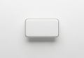 A sleek white rectangular object with a metallic sheen on a plain background Royalty Free Stock Photo
