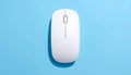 Top View of a Sleek White Wireless Computer Mouse on a Bright Blue Background technology Royalty Free Stock Photo