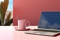 Sleek Workspace Setup Featuring Laptop, Coffee Mug, and Open Notepad on Desk