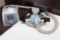 Sleep Apnea CPAP mask, hose, headgear, and machine Royalty Free Stock Photo