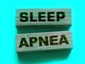 Sleep apnea words on wooden blocks. Sleep disorders healthcare concept Royalty Free Stock Photo