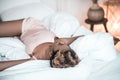 Darkskinned woman sleeping arms outstretched to sides Royalty Free Stock Photo