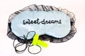 Sleep mask on white Sweet dreams ear plugs Royalty Free Stock Photo