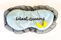 Sleep mask on white Sweet dreams ear plugs Royalty Free Stock Photo