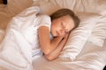 Sleep mobile phone beautiful young girl bed blanket view lying, concept female cell for person and calm rest, room Royalty Free Stock Photo