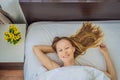 Sleep without a pillow. Young Woman Sleeping In Bed without a pillow. Portrait Of Beautiful Female Resting On Royalty Free Stock Photo