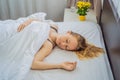 Sleep without a pillow. Young Woman Sleeping In Bed without a pillow. Portrait Of Beautiful Female Resting On Royalty Free Stock Photo