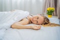 Sleep without a pillow. Young Woman Sleeping In Bed without a pillow. Portrait Of Beautiful Female Resting On Royalty Free Stock Photo