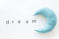 Sleep time concept with moon and dream copy on white background top view
