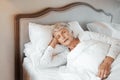 Sleep is vital for overall health. a senior woman sleeping in bed in a nursing home. Royalty Free Stock Photo