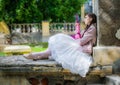 Sleep woman with a pink rifle resting Royalty Free Stock Photo