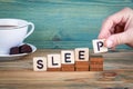 Sleep. Wooden letters on the office desk, informative and communication background