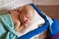 Sleeper newborn baby in white box