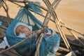 Sleeping baby in a boat in Tonle Sap Lake, Cambodia