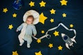 Sleeping baby boy on a background of the starry sky Royalty Free Stock Photo