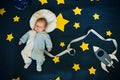 Sleeping baby boy on a background of the starry sky Royalty Free Stock Photo