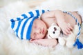 Sleeping baby boy with plush toy Royalty Free Stock Photo