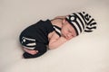 Sleeping Baby Boy in Romper & Hat Royalty Free Stock Photo