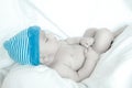 Sleeping baby with a cap Royalty Free Stock Photo