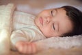 Sleeping baby covered with knitted blanket Royalty Free Stock Photo